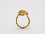 18k gold ring with raw diamond.