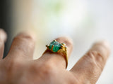 18k gold ring with raw emerald 