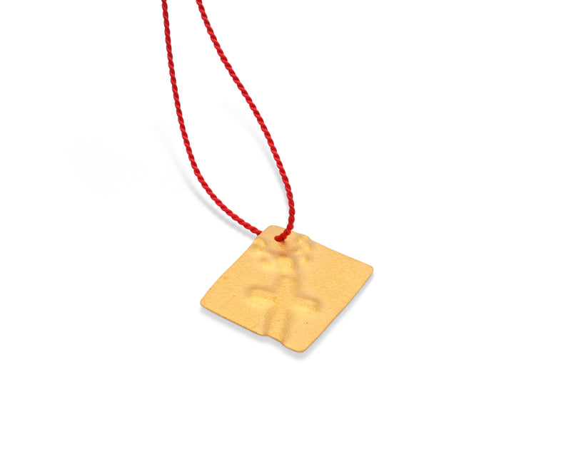 Guldgubber Fine gold pendant with cross imprint and red silk cord