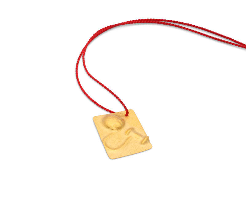Guldgubber Fine gold pendant with pearl earring imprint and red silk cord